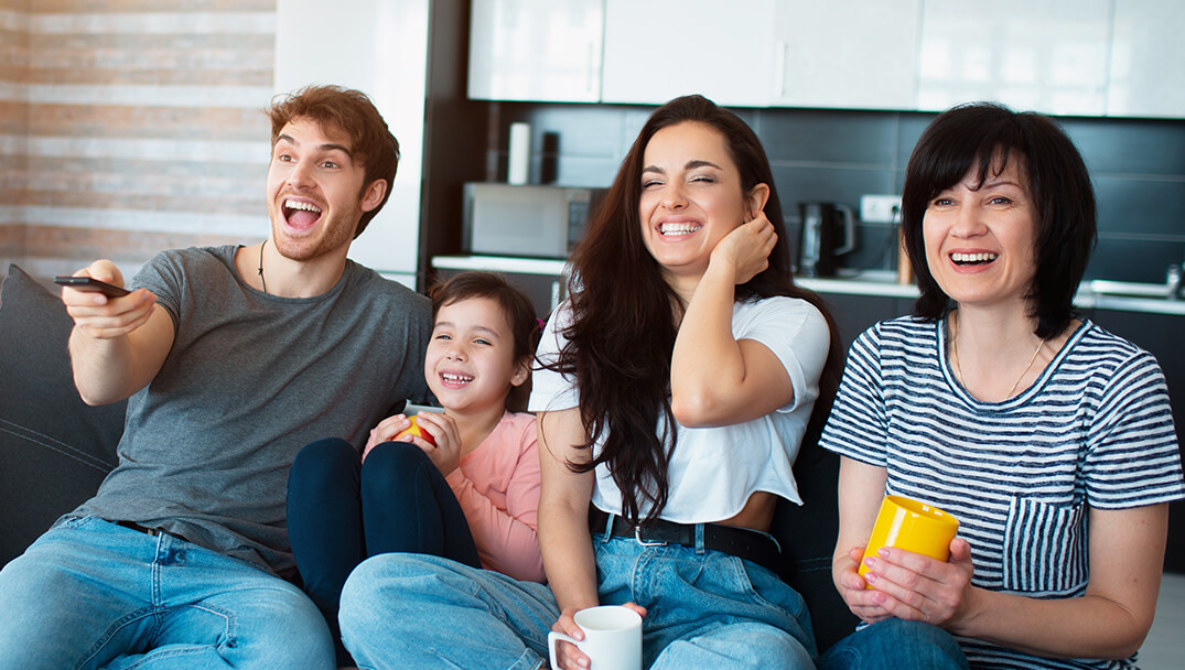 Family enjoying premium IPTV streaming at home